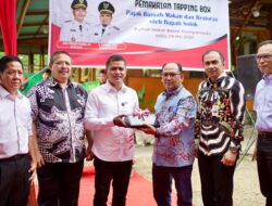 Bupati Solok Resmikan Penggunaan Perdana Tapping Box Pajak di Rumah Makan dan Restoran